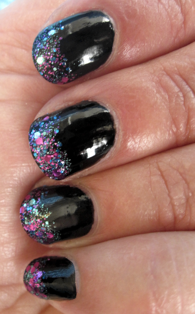 black nails with glitter tips