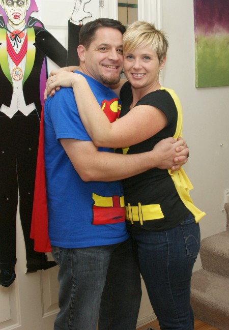 Dave and Nicole Batten as Superman and Batgirl