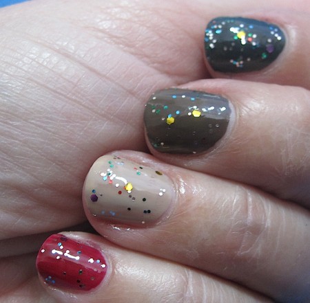ELF Chic Confetti over Green Machine (forefinger), Smoky Brown (middle), Desert Haze (ring), and Cherry Bomb (pinky).
