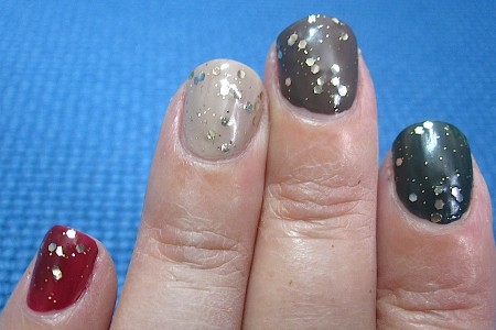 ELF Gold Star over Green Machine (forefinger), Smoky Brown (middle), Desert Haze (ring), and Cherry Bomb (pinky).